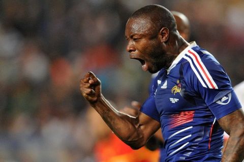 French defender William Gallas jubilates after scoring a goal during  the friendly football match Tunisia vs France at the 07 Novembre Stadium in Rades, on May 30, 2010 prior to the FIFA World Cup 2010 hosted by South Africa. AFP PHOTO / FRANCK FIFE (Photo credit should read FRANCK FIFE/AFP/Getty Images)