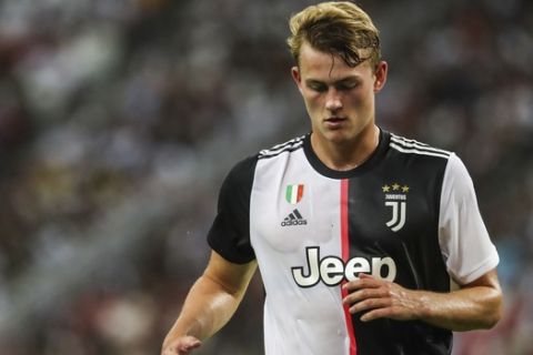 Juventus' Matthijs de Ligt in action during the International Champions Cup soccer match between Juventus and Tottenham Hotspur in Singapore, Sunday, July 21, 2019. (AP Photo/Danial Hakim)