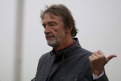 Jim Ratcliffe, the founder of the INEOS Chemicals company, waits for the start of Marathon runner Eliud Kipchoge from Kenya at the INEOS 1:59 Challenge attempt to run a sub two-hour marathon in Vienna, Austria, Saturday, Oct. 12, 2019. (AP Photo/Ronald Zak)