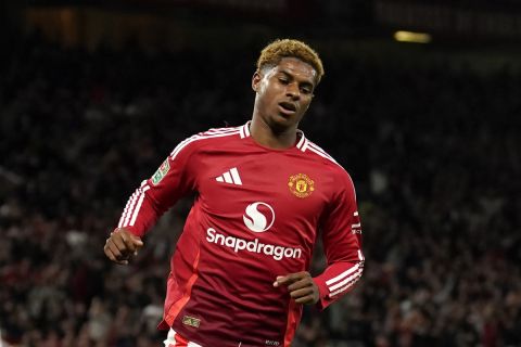 Manchester United's Marcus Rashford after scoring the fifth goal during the English League Cup soccer match between Manchester United and Barnsley at Old Trafford, Manchester, England, Tuesday, Sept. 17, 2024. (AP Photo/Dave Thompson)