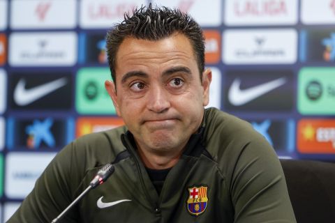 Barcelona's head coach Xavi Hernandez attends a press conference in Barcelona, Spain, Saturday, May 25, 2024. Barcelona says coach Xavi Hernandez is leaving the club at the end of the season. The club made the announcement on Friday after a meeting between club president Joan Laporta, Xavi and other senior figures at the team training ground. (AP Photo/Joan Monfort)