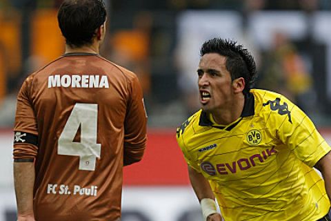 DORTMUND, GERMANY - FEBRUARY 19:  Lucas Barrios of Dortmund celebrates scoring the first goal during the Bundesliga match between Borussia Dortmund and FC St. Pauli at Signal Iduna Park on February 19, 2011 in Dortmund, Germany.  (Photo by Friedemann Vogel/Bongarts/Getty Images)