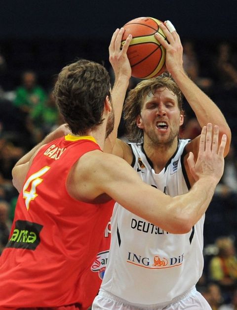 Spain's Pau Gasol and Germany's Dirck Nowitzki fight for a ball during the group E 2nd round qualification match between Spain and Germany during the EuroBasket2011 in Vilnius on 07 September,2011.
AFP PHOTO/JOE KLAMAR (Photo credit should read JOE KLAMAR/AFP/Getty Images)