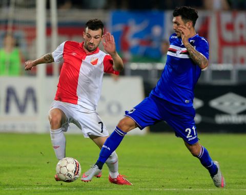 NOVI SAD, SERBIA - AUGUST 06: Aleksandar Stanisavljevic (L) of Vojvodina Novi Sad in action against Roberto Soriano (R) of Sampdoria during the UEFA Europa League Third Qualifying Round 2nd Leg match between Vojvodina Novi Sad and Sampdoria at Karadjordje stadium on August 06, 2015 in Novi Sad, Serbia.  (Photo by Srdjan Stevanovic/Getty Images)