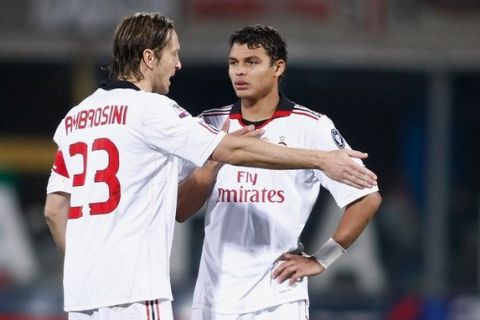 CATANIA, ITALY - JANUARY 29:  Massimo Ambrosini (L) and Thiago Silva of Milan discuss tactics during the Serie A match between Catania Calcio and AC Milan at Stadio Angelo Massimino on January 29, 2011 in Catania, Italy.  (Photo by Maurizio Lagana/Getty Images)