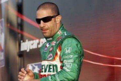 FILE - In this June 27, 2009, file photo, Tony Kanaan waits during driver introductions for the IRL Suntrust Indy Challenge auto race at Richmond International Raceway in Richmond, Va.   (AP Photo/Steve Helber)