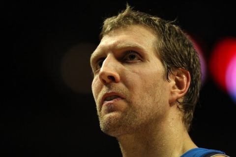 CHICAGO, IL - JANUARY 20: Dirk Nowitzki #41 of the Dallas Mavericks walks off of the court during a time-out against the Chicago Bulls at the United Center on January 20, 2011 in Chicago, Illinois. The Bulls defeated the Mavericks 82-77. NOTE TO USER: User expressly acknowledges and agrees that, by downloading and/or using this photograph, User is consenting to the terms and conditions of the Getty Images License Agreement. (Photo by Jonathan Daniel/Getty Images)