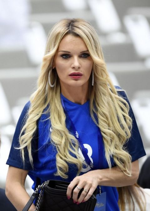 France's forward Dumitri Payet's wife Ludivine Payet is pictured ahead of the Euro 2016 group A football match between France and Romania at Stade de France, in Saint-Denis, north of Paris, on June 10, 2016. / AFP PHOTO / MIGUEL MEDINA