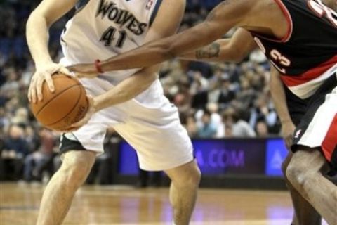 Portland Trail Blazers' Marcus Camby, right, defends Minnesota Timberwolve's Kosta Koufos in the first quarter of an NBA Basketball game, Friday, Jan. 7, 2011, in Minneapolis. (AP Photo/Stacy Bengs)