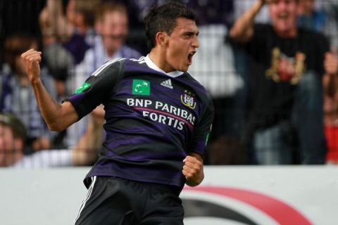 Anderlecht's Matias Suarez celebrates after scoring a goal during the Belgium Jupiler Pro League football match SC Lokeren vs RSC Anderlecht on August 14, 2011 in Lokeren.   AFP PHOTO / BELGA / VIRGINIE LEFOUR
BELGIUM OUT (Photo credit should read VIRGINIE LEFOUR/AFP/Getty Images)