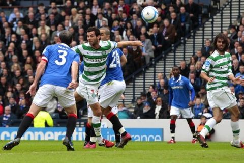 Celtic's Joe Ledley (2nd L) scores against Rangers during their CIS Cup final soccer match at Hampden Park stadium in Glasgow, Scotland March 20, 2011. REUTERS/David Moir (BRITAIN - Tags: SPORT SOCCER)