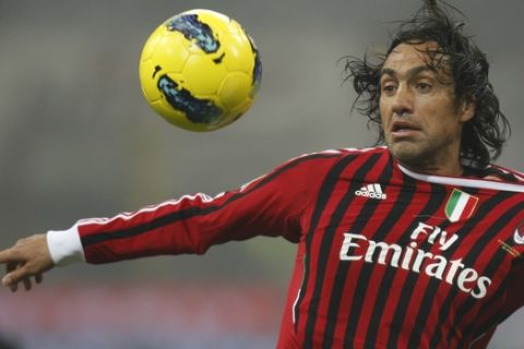 AC Milan defender Alessandro Nesta controls the ball during a Serie A soccer match between AC Milan and Inter Milan, at the San Siro stadium in Milan, Italy, Sunday, Jan.15, 2012. (AP Photo/Luca Bruno)