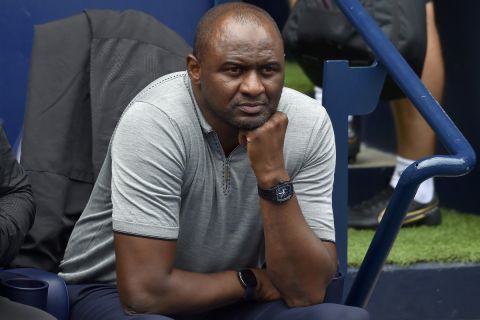 Crystal Palace's head coach Patrick Vieira sits on the bench during the English Premier League soccer match between Manchester City and Crystal Palace at Etihad stadium in Manchester, England, Saturday, Aug. 27, 2022. (AP Photo/Rui Vieira)