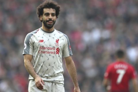 Liverpool's Mohamed Salah during the English Premier League soccer match between Manchester United and Liverpool at Old Trafford stadium in Manchester, England, Sunday, Feb. 24, 2019. (AP Photo/Jon Super)