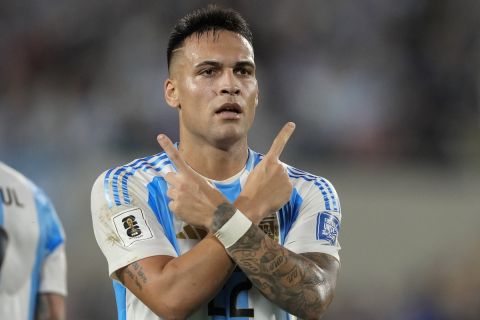 Argentina's Lautaro Martinez celebrates after scoring his side's second goal against Bolivia during a World Cup 2026 qualifying soccer match at Monumental stadium in Buenos Aires, Argentina, Tuesday, Oct. 15, 2024. (AP Photo/Natacha Pisarenko)