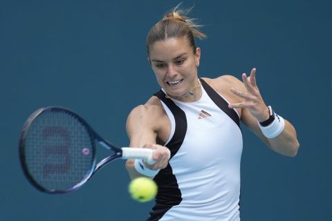 Maria Sakkari, of Greece, returns a ball from Yue Yuan, of China, in their women's second round match at the Miami Open tennis tournament, Thursday, March 21, 2024, in Miami Gardens, Fla. (AP Photo/Rebecca Blackwell)