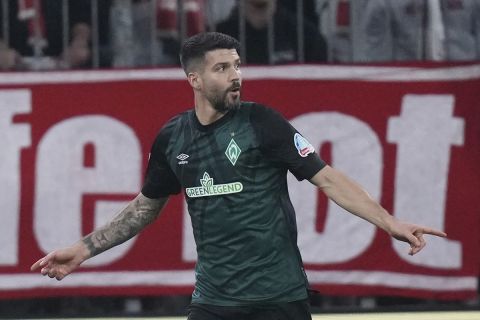 Bremen's Anthony Jung celebrates after scoring his side's first goal during the Bundesliga soccer match between Bayern Munich and Werder Bremen at the Allianz Arena in Munich, Germany, Tuesday, Nov. 8, 2022. (AP Photo/Matthias Schrader)