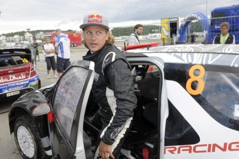 Finnish Citroen pilot Kimi Raikkonen gestures after finishing the FIA World Rally Championship WRC Neste Oil Rally Finland in Jyvaskyla, Finland July 30, 2011. REUTERS/Martti Kainulainen/Lehtikuva (FINLAND - Tags: SPORT MOTOR RACING) THIS IMAGE HAS BEEN SUPPLIED BY A THIRD PARTY. IT IS DISTRIBUTED, EXACTLY AS RECEIVED BY REUTERS, AS A SERVICE TO CLIENTS. NO THIRD PARTY SALES. NOT FOR USE BY REUTERS THIRD PARTY DISTRIBUTORS. FINLAND OUT. NO COMMERCIAL OR EDITORIAL SALES IN FINLAND