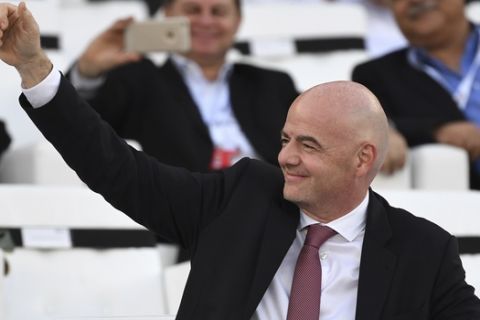 FIFA President Gianni Infantino smiles prior the AFC Asian Cup final match between Japan and Qatar in Zayed Sport City in Abu Dhabi, United Arab Emirates, Friday, Feb. 1, 2019. (AP Photo/Hassan Ammar)