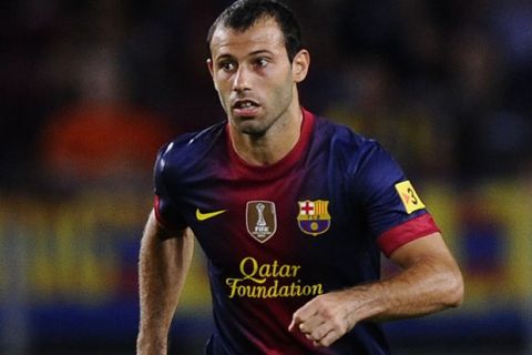 BARCELONA, SPAIN - AUGUST 19:  Javier Mascherano of FC Barcelona runs with the ball during the La Liga match between FC Barcelona and Real Sociedad de Futbol at Camp Nou on August 19, 2012 in Barcelona, Spain.  (Photo by David Ramos/Getty Images)