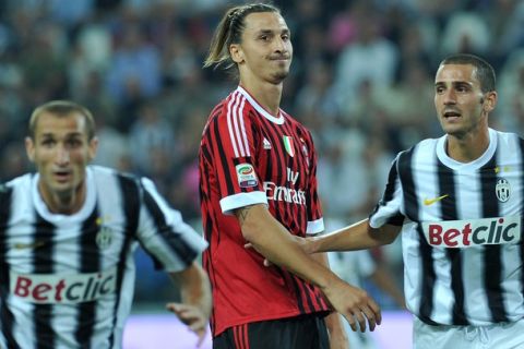 AC Milan's Swedish forward Zlatan Ibrahimovic (C) reacts next to Juventus players during the A series football match between Juventus and AC Milan, on October 2, 2011, at the Juventus stadium in Turin. AFP PHOTO / OLIVIER MORIN (Photo credit should read OLIVIER MORIN/AFP/Getty Images)