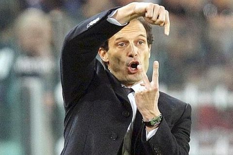 AC Milan's coach Massimiliano Allegri gestures during their Italian Cup semi-final soccer match against Juventus at the Juventus stadium in Turin March 20, 2012.   REUTERS/Alessandro Garofalo (ITALY - Tags: SPORT SOCCER)