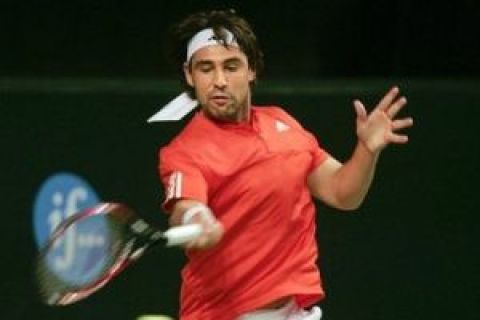 Marcos Baghdatis of Cyprus returns a shot to Arnault Clement of France, in the Stockholm Open tennis semi final in Stockholm, Sweden, Friday Oct. 23, 2009. (AP Photo/Scanpix Sweden/Soren Andersson)  **  SWEDEN OUT  **