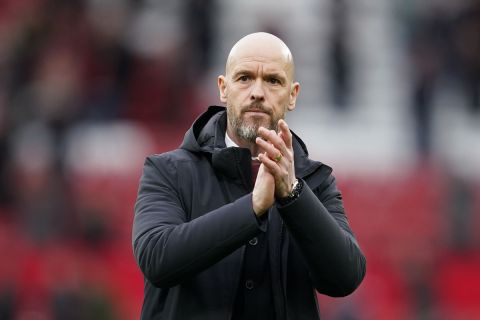 Manchester United's head coach Erik ten Hag applauds after the English Premier League soccer match between Manchester United and Liverpool at the Old Trafford stadium in Manchester, England, Sunday, April 7, 2024. (AP Photo/Dave Thompson)