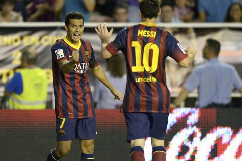 Partido de Liga entre el Rayo y el Barcelona en el Teresa Rivero. En la imagen, Pedro celebra uno de sus goles. Spanish League match between Rayo and Barcelona. In this picture, Pedro celebrates one of their goals.