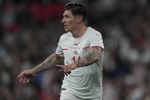 Switzerland's Steven Zuber in action during an international soccer match between England and Switzerland at Wembley Stadium in London, Saturday, March 26, 2022. (AP Photo/Alastair Grant)