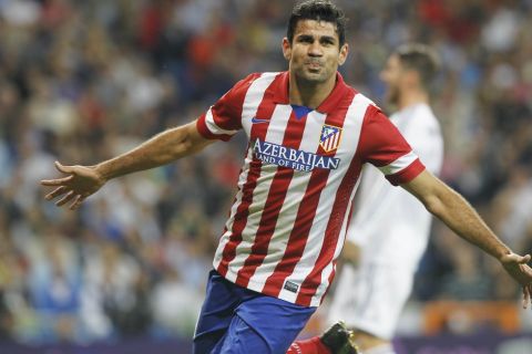 Partido de Liga entre el Real Madrid y el Atlético en el Bernabéu. En la imagen, Diego Costa celebra su gol. 

Spanish League match between Real Madrid and Atlético. In this picture, Diego Costa celebrates his goal.