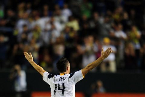 Irish international and LA Galaxy striker Robbie Keane celebrates scoring on his debut against the San Jose Earthquakes on August 20, 2011 at the Home Depot Center in Carson, California where Keane scored to give the Galaxy the lead in a 2-0 victory over the Earthquakes. AFP PHOTO/Frederic J.BROWN (Photo credit should read FREDERIC J. BROWN/AFP/Getty Images)