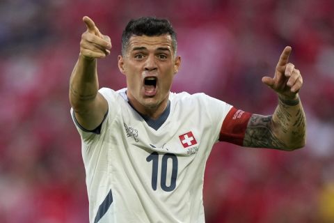 Switzerland's Granit Xhaka reacts during a Group A match between Scotland and Switzerland at the Euro 2024 soccer tournament in Cologne, Germany, Wednesday, June 19, 2024. (AP Photo/Martin Meissner)