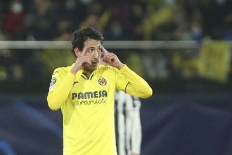 Villarreal's Dani Parejo celebrates after scoring his side's opening goal during the Champions League, round of 16, first leg soccer match between Villarreal and Juventus at the Ceramica stadium in Villarreal, in Villarreal, Spain, Tuesday, Feb. 22, 2022. (AP Photo/Alberto Saiz)