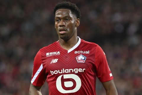 Lille's Jonathan David reacts during the French League One soccer match between Lille and Marseille at the Pierre Mauroy stadium in Villeneuve d'Ascq, northern France, Friday, April 5, 2024. (AP Photo/Matthieu Mirville)