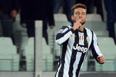 Juventus' midfielder Claudio Marchisio celebrates after scoring during the Champions League match between Juventus and FC Nordsjaelland on November 7, 2012 in the stadium of Alps in Turin.    AFP PHOTO / OLIVIER MORIN        (Photo credit should read OLIVIER MORIN/AFP/Getty Images)