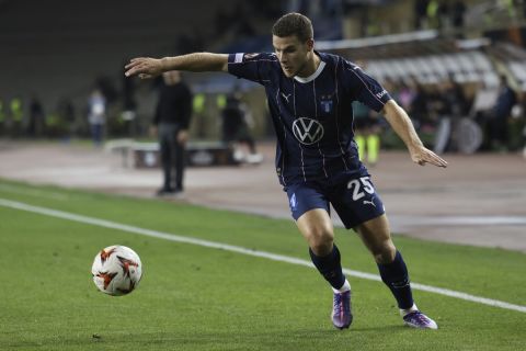 Malmo's Gabriel Busanello kicks the ball during the Europa League opening phase soccer match between Qarabag and Malmo at the Tofiq Bahramov Republican stadium in Baku, Azerbaijan, Thursday, Oct. 3, 2024. (AP Photo)