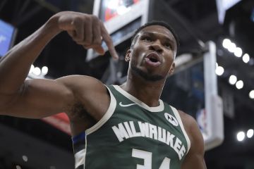 Milwaukee Bucks' Giannis Antetokounmpo reacts after making a shot and being fouled during the first half of an NBA basketball game Saturday, Nov. 2, 2024, in Milwaukee. (AP Photo/Morry Gash)