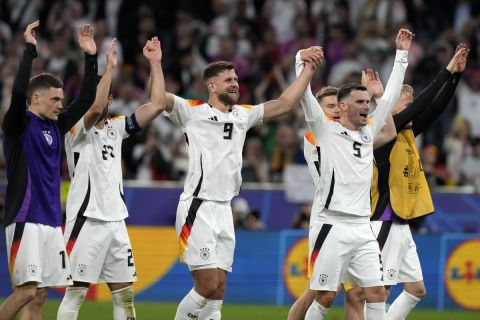 Germany's Niclas Fuellkrug celebrates with his team and fans after winning a Group A match between Germany and Scotland at the Euro 2024 soccer tournament in Munich, Germany, Friday, June 14, 2024. (AP Photo/Frank Augstein)