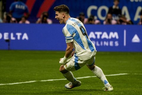 Argentina's Julián Álvarez (9) celebrates his goal against Canada in the second half during a Copa America Group A soccer match in Atlanta, Thursday, June 20, 2024. (AP Photo/Mike Stewart)