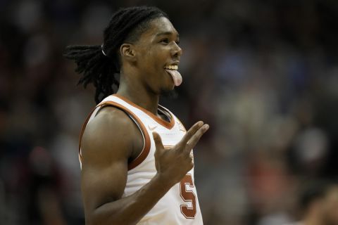 Texas guard Marcus Carr celebrates after scoring against Xavier in the first half of a Sweet 16 college basketball game in the Midwest Regional of the NCAA Tournament Friday, March 24, 2023, in Kansas City, Mo. (AP Photo/Charlie Riedel)