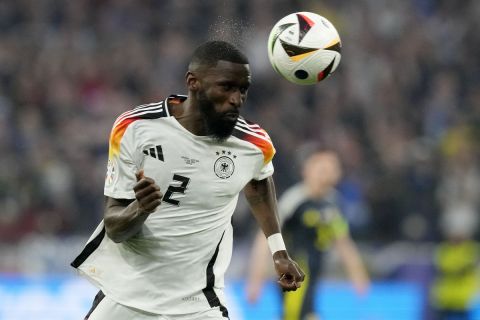 Germany's Antonio Rudiger heads the ball during a Group A match between Germany and Scotland at the Euro 2024 soccer tournament in Munich, Germany, Friday, June 14, 2024. (AP Photo/Frank Augstein)