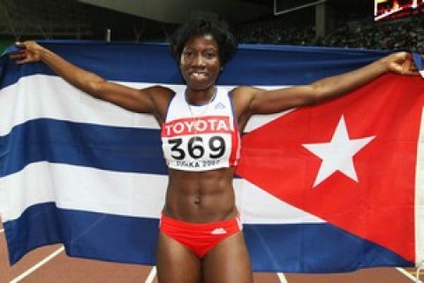 OSAKA, JAPAN - AUGUST 31:  Yargelis Savigne of Cuba celebrates winning the Women's Triple Jump Final on day seven of the 11th IAAF World Athletics Championships on August 31, 2007 at the Nagai Stadium in Osaka, Japan.  (Photo by Andy Lyons/Getty Images)