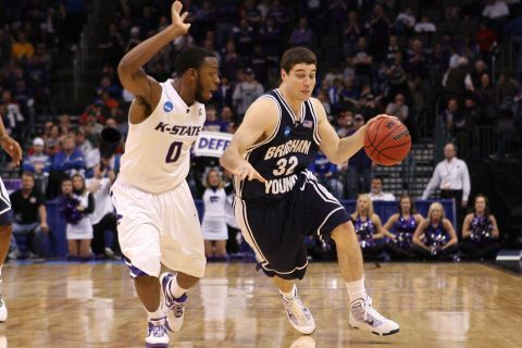 Mar 20, 2010; Oklahoma City, OK, USA; Kansas State Wildcats guard Jacob Pullen (0) defends against the BYU Cougars guard Jimmer Fredette (32) in the second round of the 2010 NCAA mens basketball tournament at the Ford Center. Kansas State defeated BYU 84-72. Mandatory Credit: Nelson Chenault-US PRESSWIRE