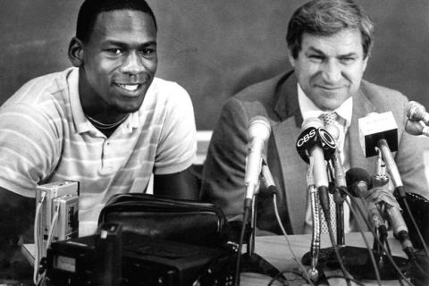 FILE -- North Carolina guard Michael Jordan, left, and Tar Heels coach Dean Smith are shown at a news conference in this May 5, 1984 photo in Chapel Hill, N.C., where Jordan announced he woould forfeit his final year of college eligibility to turn pro. Jordan, the greatest player in NBA history and the most popular athlete since Muhammad Ali is expected to announce his retirement Wednesday at a news conference in Chicago, a source with close ties to the NBA told The Associated Press on Monday night Jan. 11, 1999. (AP Photo/FILE) ORG XMIT: NY225