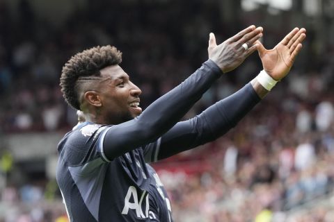 Tottenham's Emerson Royal celebrates after scoring his side's second goal during an English Premier League soccer match between Brentford and Tottenham Hotspur at the Community Stadium in London, Sunday, Aug. 13, 2023. (AP Photo/Frank Augstein)