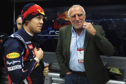 VALENCIA, SPAIN - FEBRUARY 02:  Sebastian Vettel (L) of Germany and Red Bull Racing talks with Red Bull Racing team owner Dietrich Mateschitz (R) during day two of winter testing at the Ricardo Tormo Circuit on February 2, 2011 in Valencia, Spain.  (Photo by Mark Thompson/Getty Images)