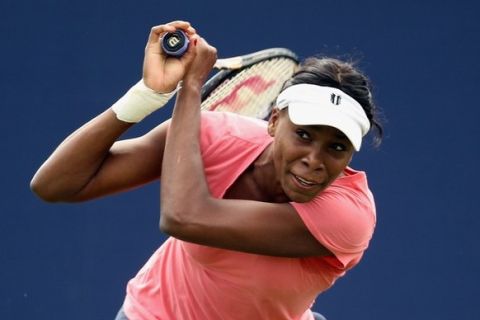 EASTBOURNE, ENGLAND - JUNE 11:  Venus Williams of the USA in action during practice on day one of the AEGON International on June 11, 2011 in Eastbourne, England.  (Photo by Bryn Lennon/Getty Images)