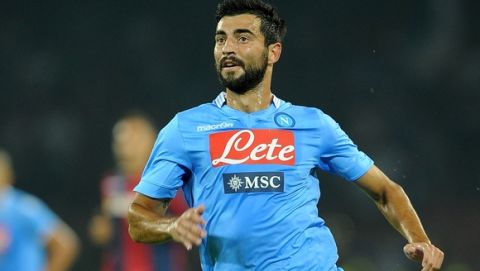 NAPLES, ITALY - AUGUST 25:  Tortajada Raul Albiol of Napoli in action during the Serie A match between SSC Napoli and Bologna Calcio at Stadio San Paolo on August 25, 2013 in Naples, Italy. (Photo by Francesco Pecoraro/Getty Images)