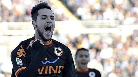 AS Roma forward Mattia Destro celebrates after scoring during a Serie A soccer match between Pescara and AS Roma, at the Adriatico stadium in Pescara, Italy, Sunday, Nov. 25, 2012. (AP Photo/Sandro Perozzi)